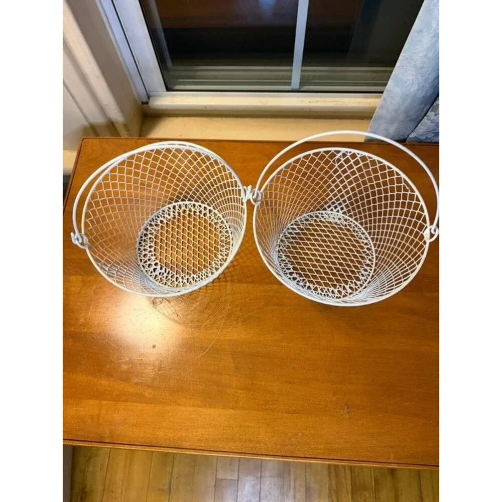 White wire mesh baskets with handles
